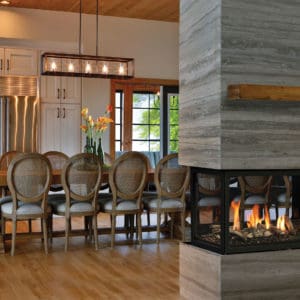 Marquis Atrium peninsula gas fireplace with driftwood log set