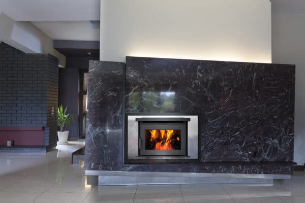 Pacific energy fp25 wood fireplace with marble surround