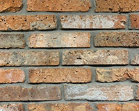 Reclaimed brick veneer image on safe home fireplace website