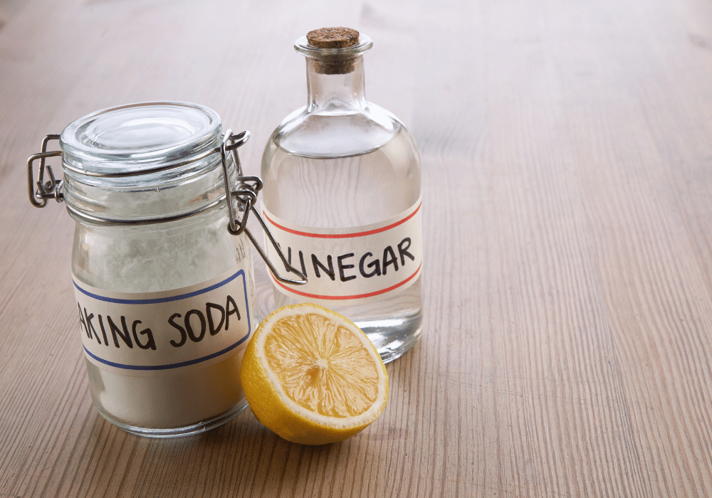 Safe home fireplace vinegar and baking soda on table with lemon cleaning fireplace glass blog image on safe home fireplace website