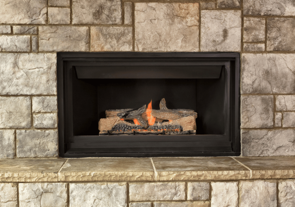Safe home fireplace gas fireplace insert surrounded by stone bricks gas fireplace inserts blog image on safe home fireplace website