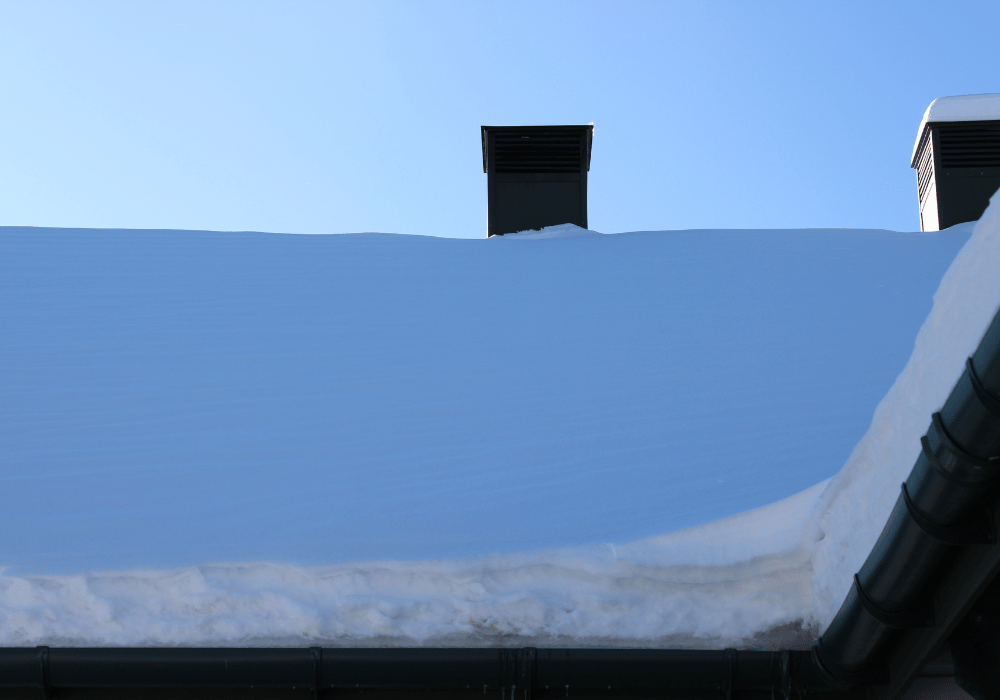 Chimney cap and spark arrestor installed on a roof to protect the fireplace flue from debris and animals.